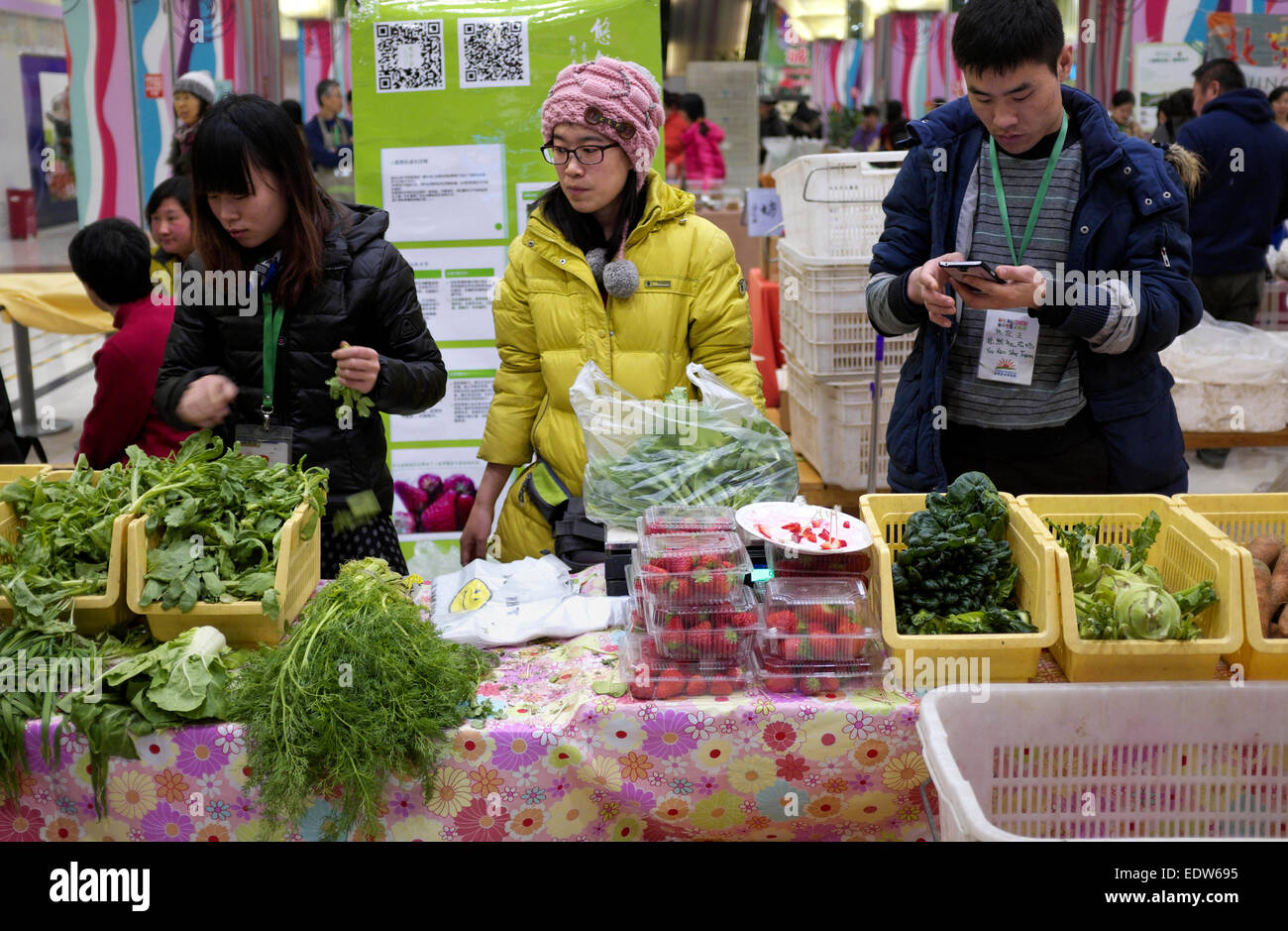 Organic vegetables grown by local small farmers are on sale at Country Fair & Beijing Farmer’s Market in Beijing, China. Stock Photo