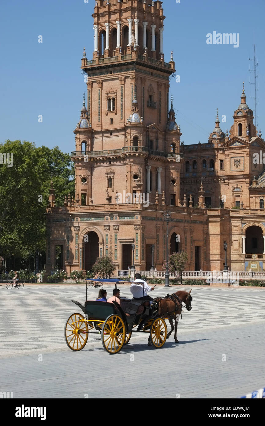 Seville Spain: Horse and Carriage is a popular sightseeing choice for tourists in Seville Stock Photo