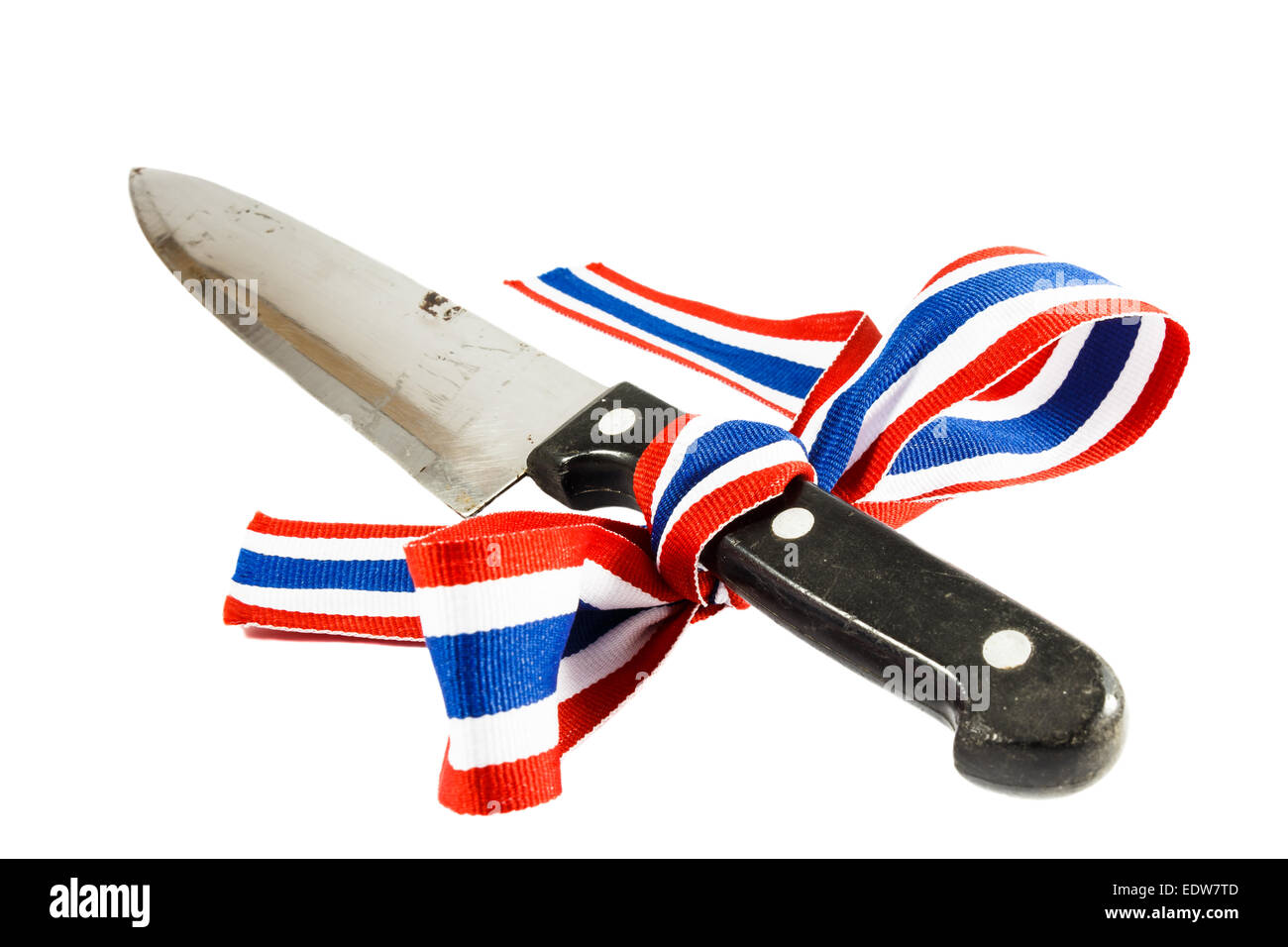 Symbol of Corruption and violence in Thailand (Dirty knife was binded by thai flag ribbon) Stock Photo