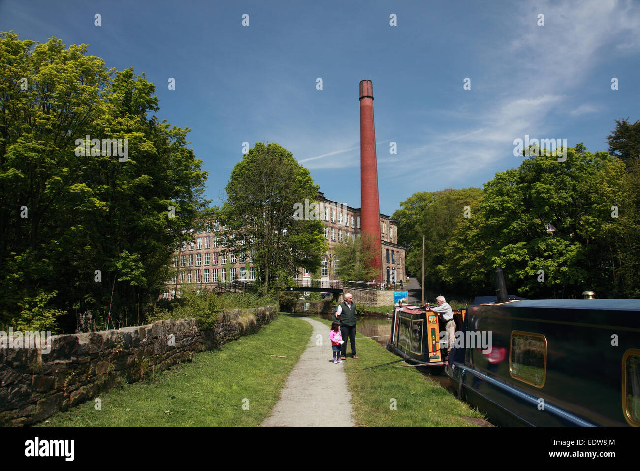 Clarence Mill, a former cotton mill, by the Macclesfield Canal in Bollington, Cheshire Stock Photo