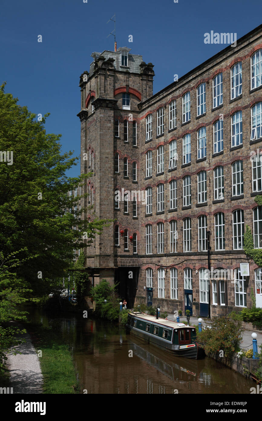 Clarence Mill, a former cotton mill, by the Macclesfield Canal in Bollington, Cheshire Stock Photo