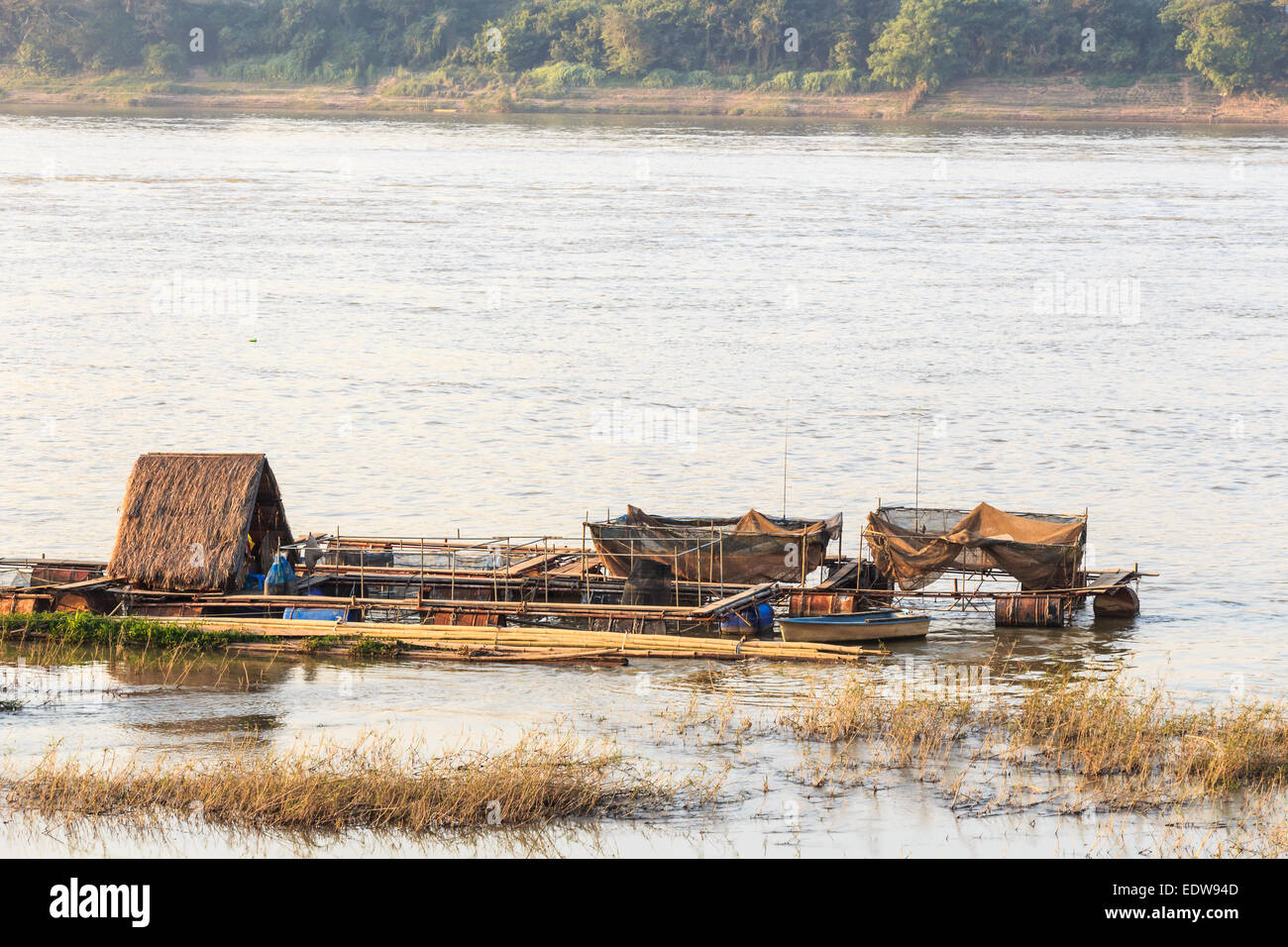 native houseboat on Mekong river in the evening at Chiang Khan ,Loei ,Thailand Stock Photo