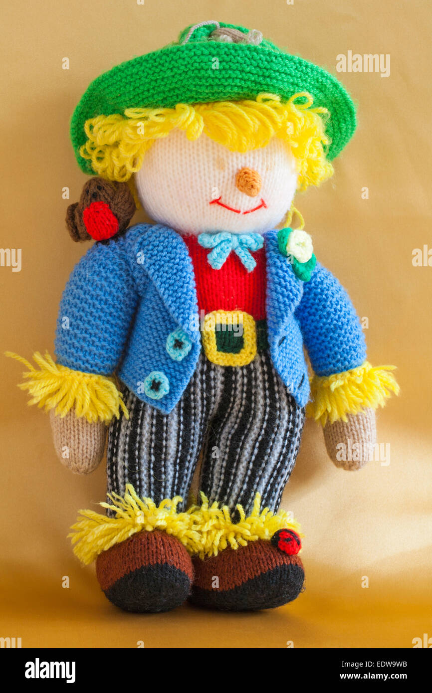Knitted doll knitted toy Wurzel Gummidge scarecrow isolated on