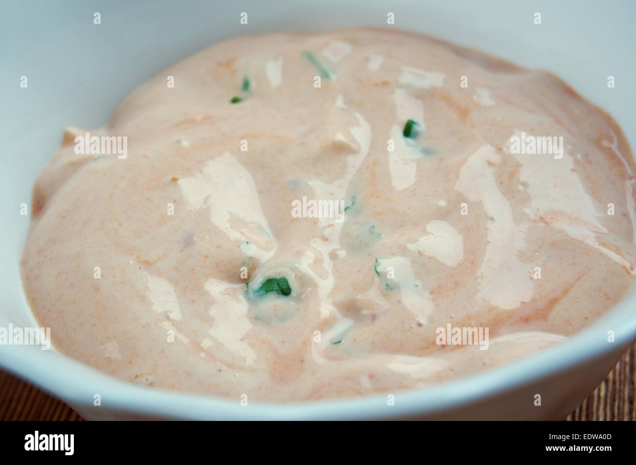 Russian dressing Rose sauce made of a blend of mayonnaise and ketchup complemented Stock Photo