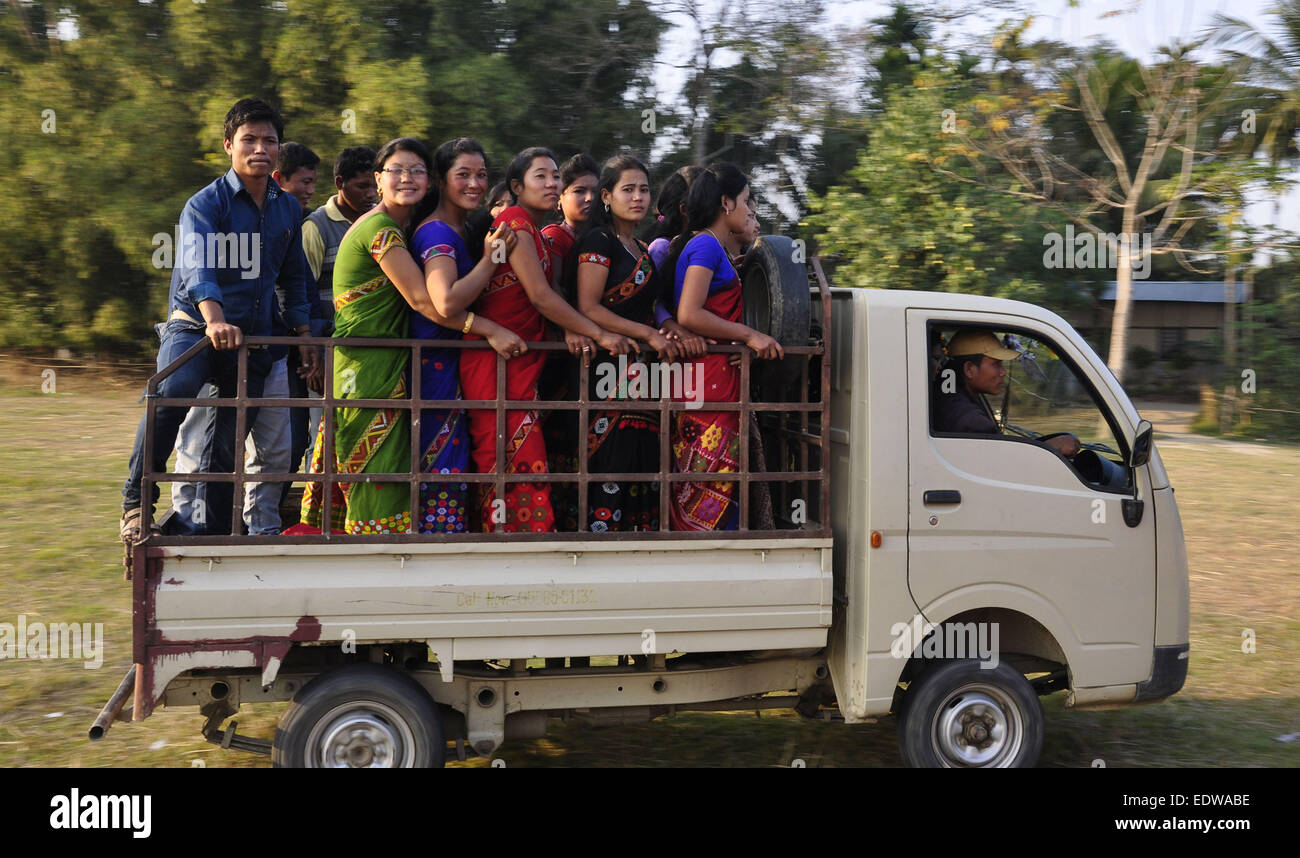 Majuli, Assam, India. 10th Jan, 2015. Mishing tribal girls wearing traditional attire on a mini carrying van during a tribal festival in Majuli river island in Jorhat district of northeastern Assam state on January 10. 2015. Credit:  Luit Chaliha/ZUMA Wire/ZUMAPRESS.com/Alamy Live News Stock Photo