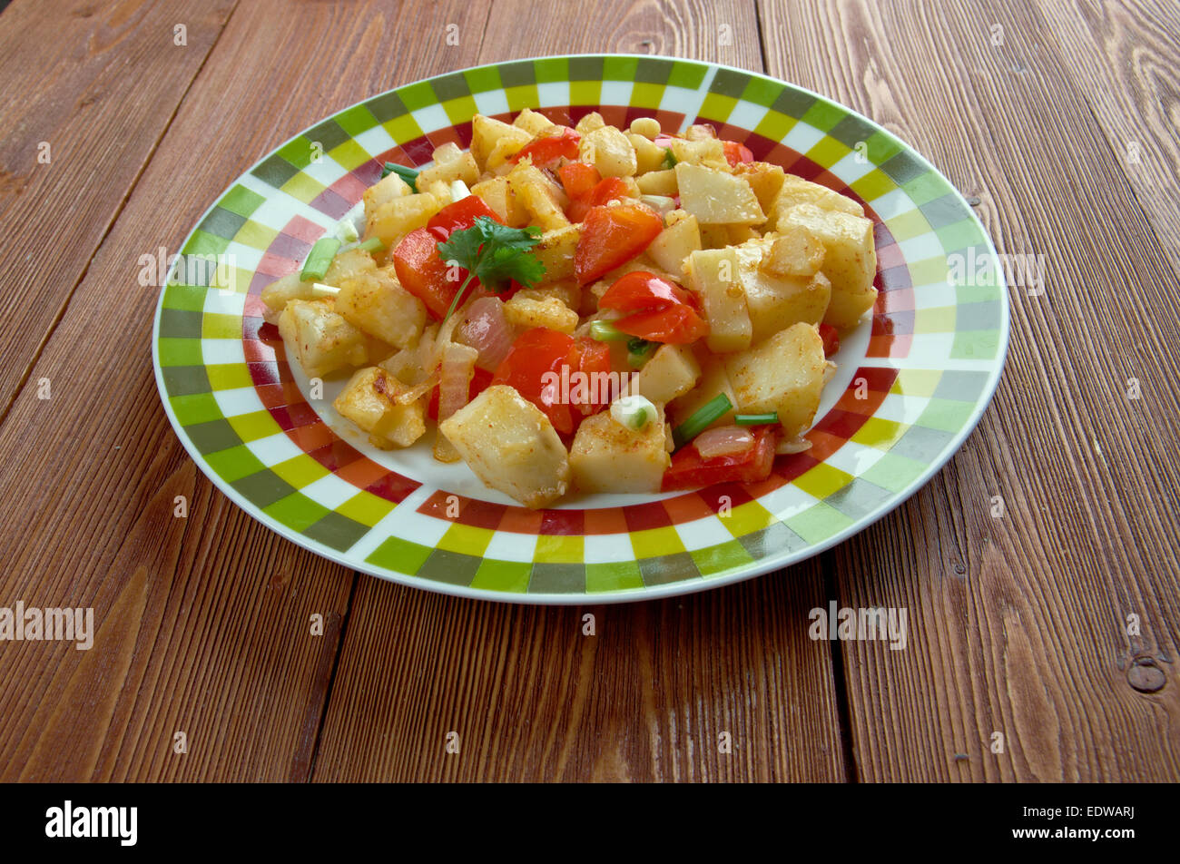 Potatoes O'Brien dish of panfried potatoes along with green and red bell peppers Stock Photo
