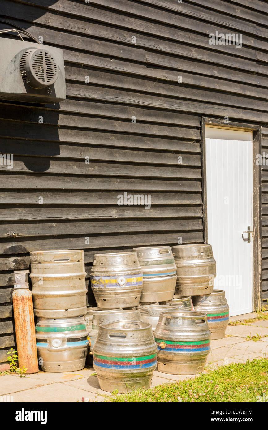Beer barrels stacked behind Chichester Yacht Club, Birdham, West Sussex
