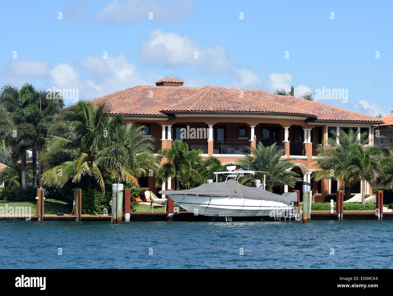 Expensive waterfront home and boat dock in Florida Stock Photo Alamy