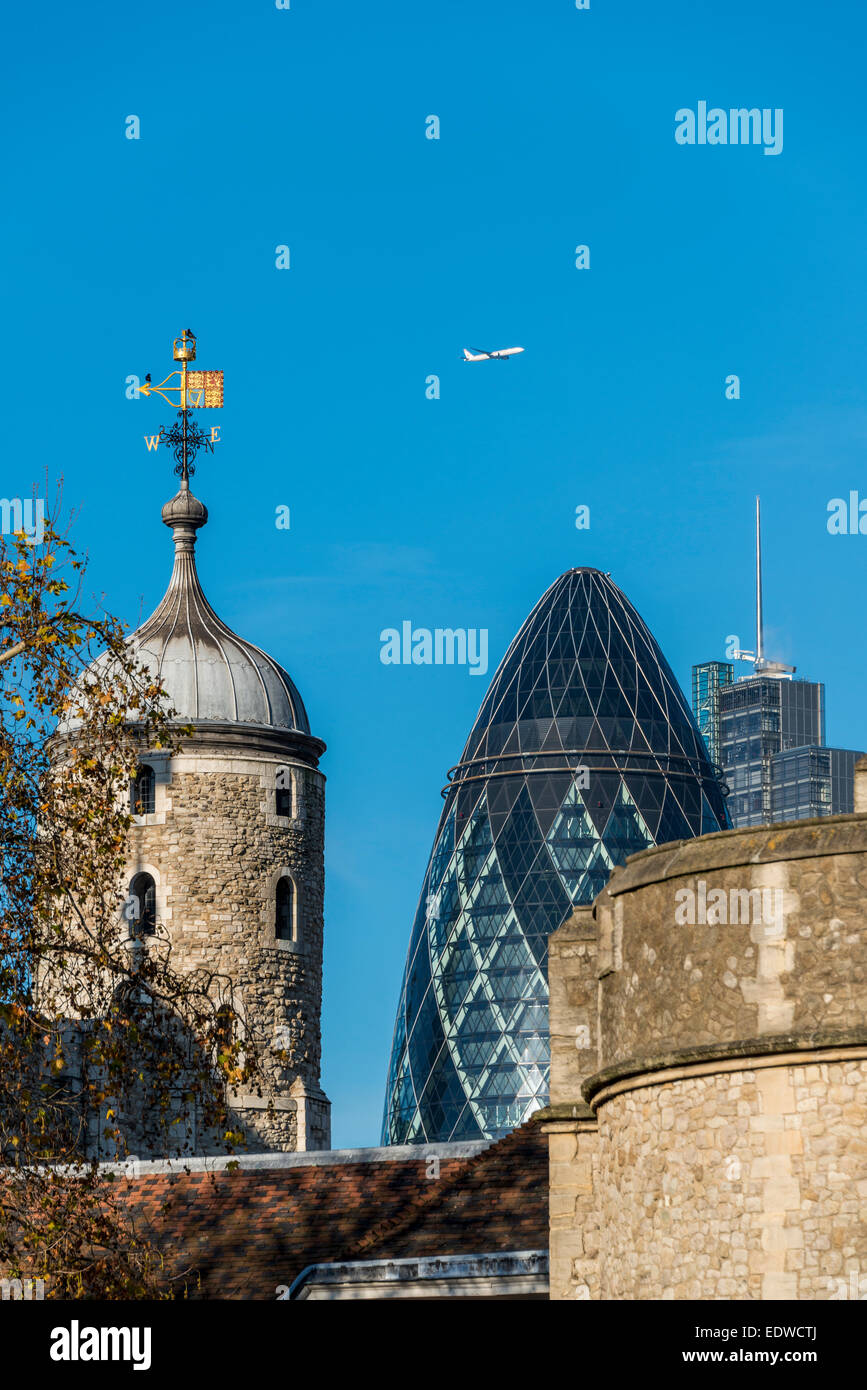The top of the Gherkin alongside the Tower of London, icons old and new Stock Photo