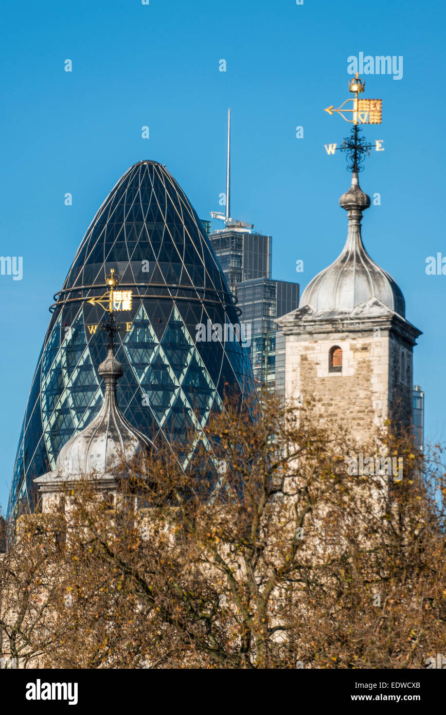 The top of the Gherkin alongside the Tower of London. Stock Photo