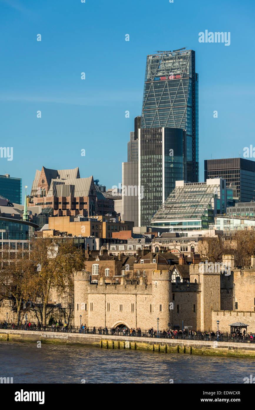 Looking over the Tower of London to the Willis Building and Cheesegrater in the City of London Stock Photo