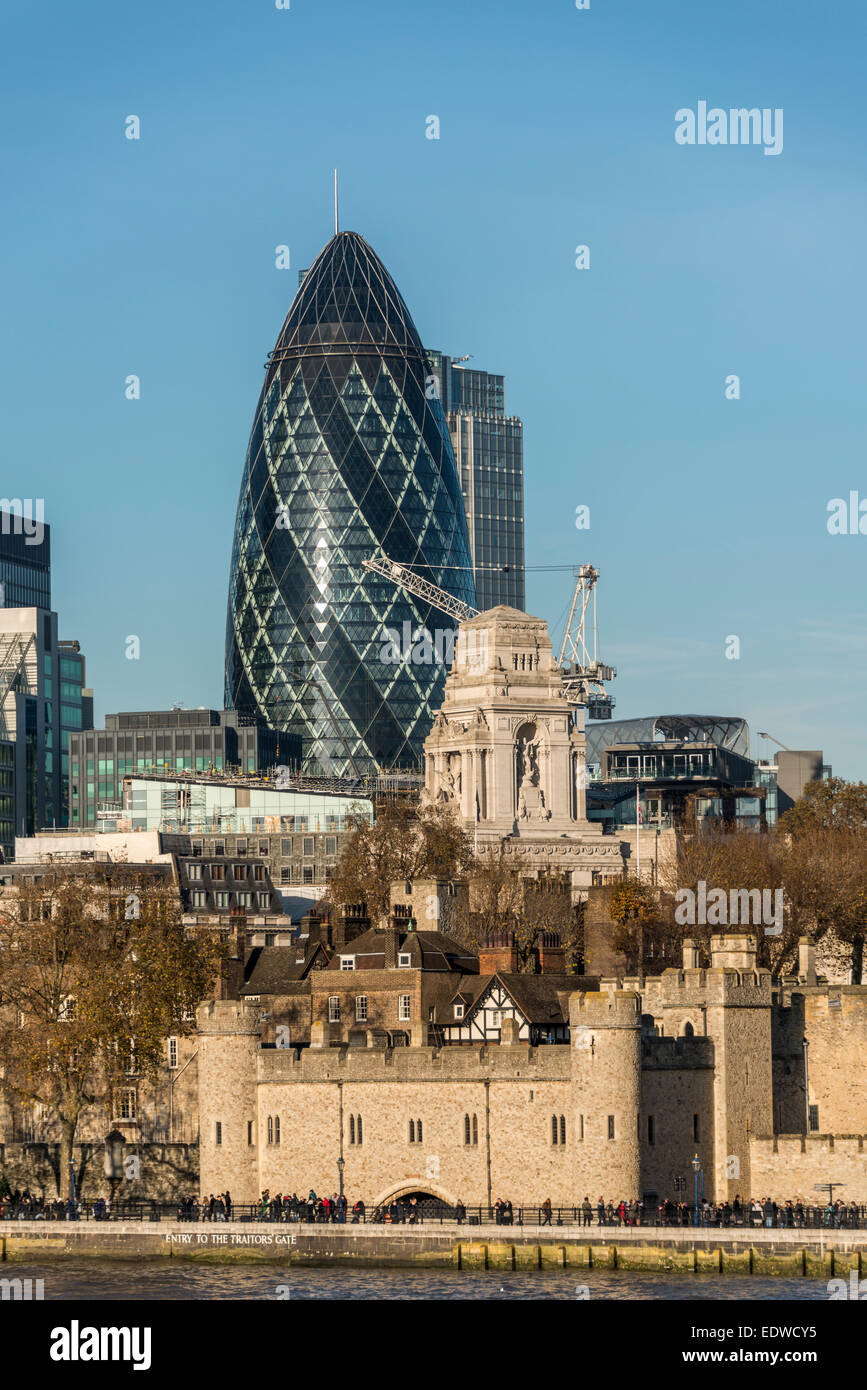 Looking over the Tower of London and the Port of London Authority at Trinity Square to the Gherkin in the City of London Stock Photo