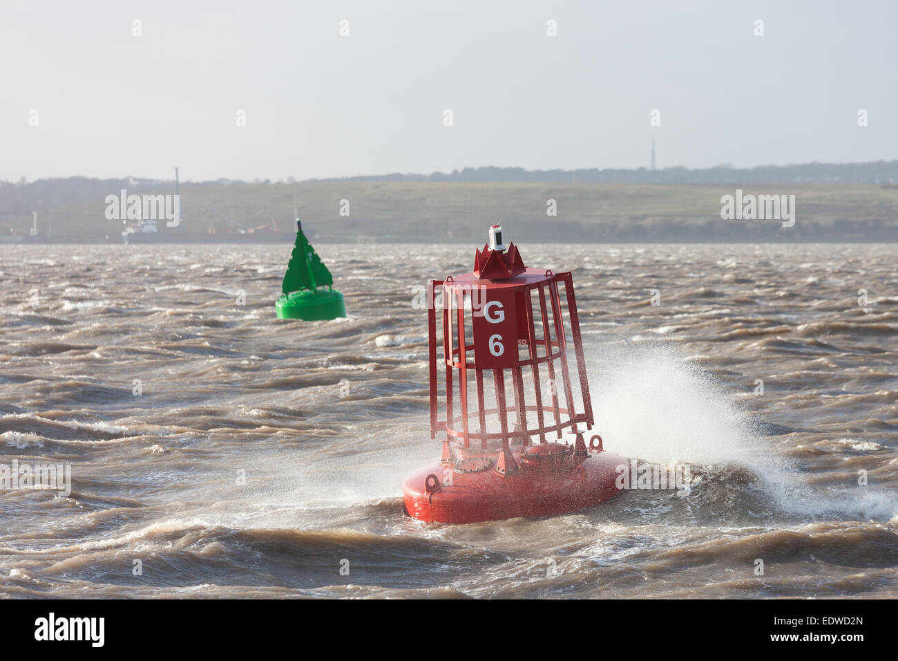 Liverpool, Merseyside, UK. 10th January, 2015. Waves crash against buoys in the River Mersey Credit:  Adam Vaughan/Alamy Live News Stock Photo