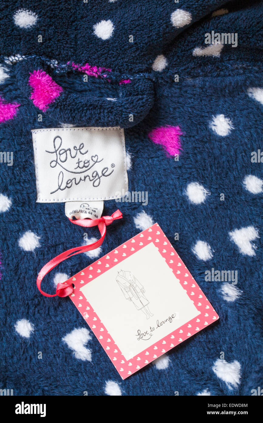 Love to lounge label and tag in dressing gown Stock Photo