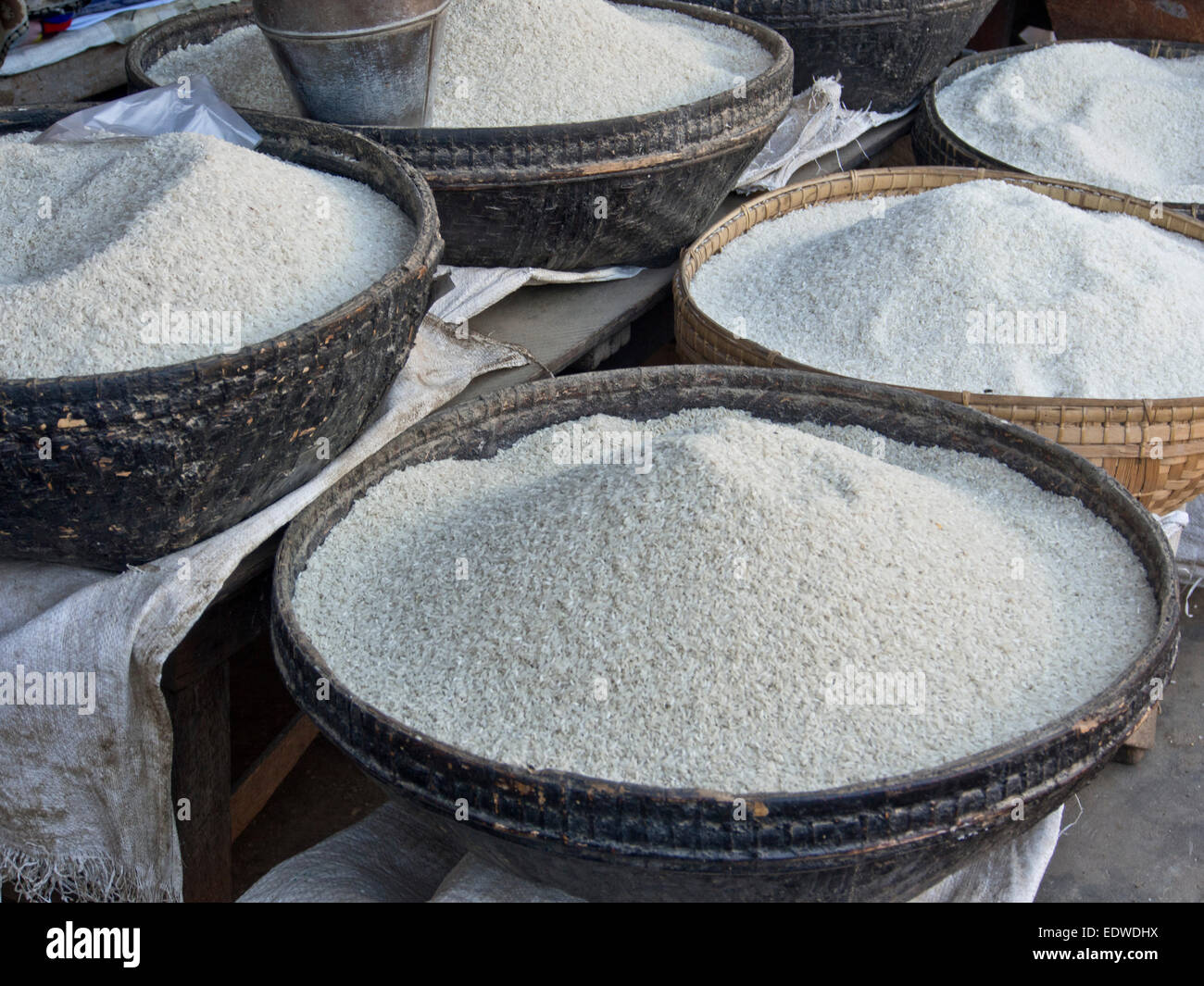 Varieties of rice in sacks at a market place in central Myanmar Stock ...