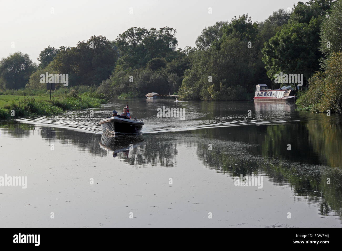 Boating on River Ouse at Houghton Mill Stock Photo