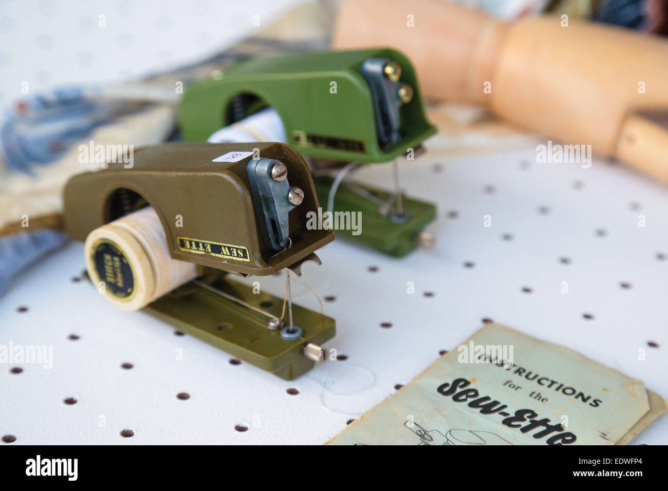 Vintage manual mini sewing machine Stock Photo Alamy