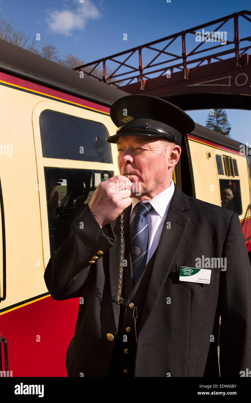 Train guard blowing whistle hires stock photography and images Alamy