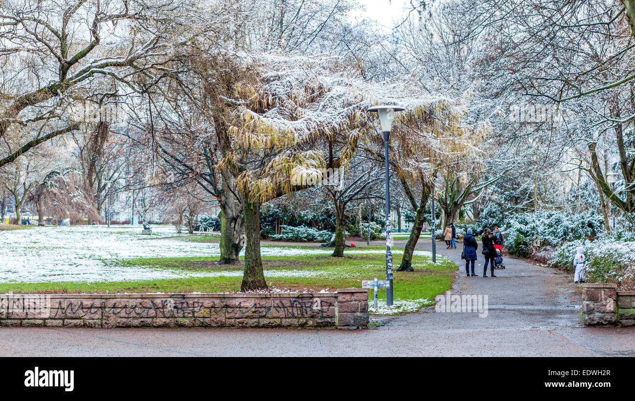 People walking in Public park, Volkspark an Weinberg, after snow in Winter, Mitte, Berlin Stock Photo