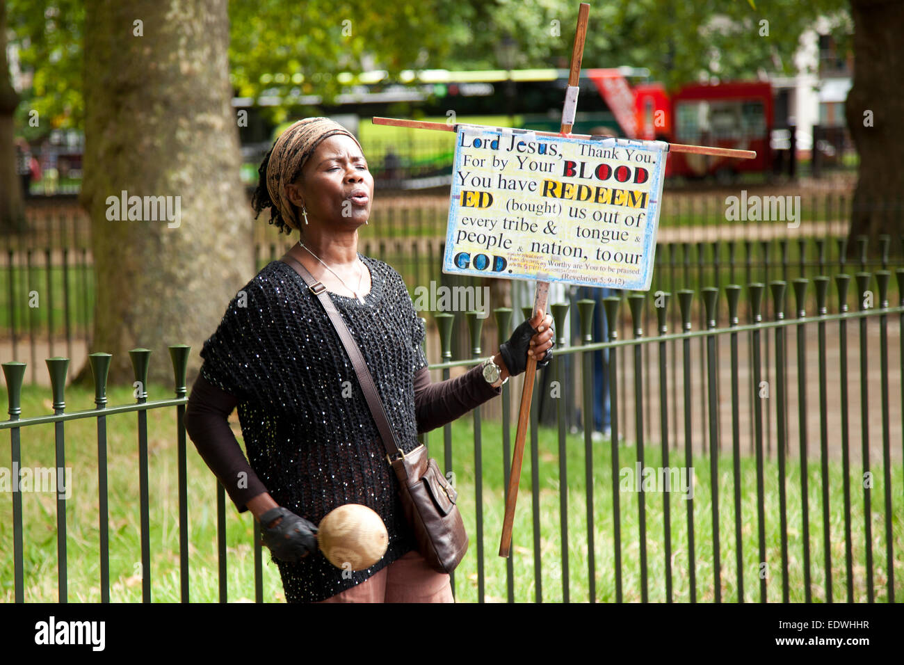 Woman speaker at Speakers Corner Hyde Park London where anyone can have free speech Stock Photo