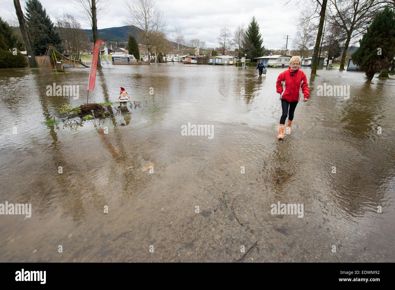 Bad Koetzting, Germany. 10th Jan, 2015. A campsite is flooded by the Weisser Regen river in Bad Koetzting, Germany, 10 January 2015. First floodings occured in Northern and Eastern Bavaria. For the weekend, the German Meteorological Service has announced more thaw. PHOTO: ARMIN WEIGEL/dpa/Alamy Live News Stock Photo