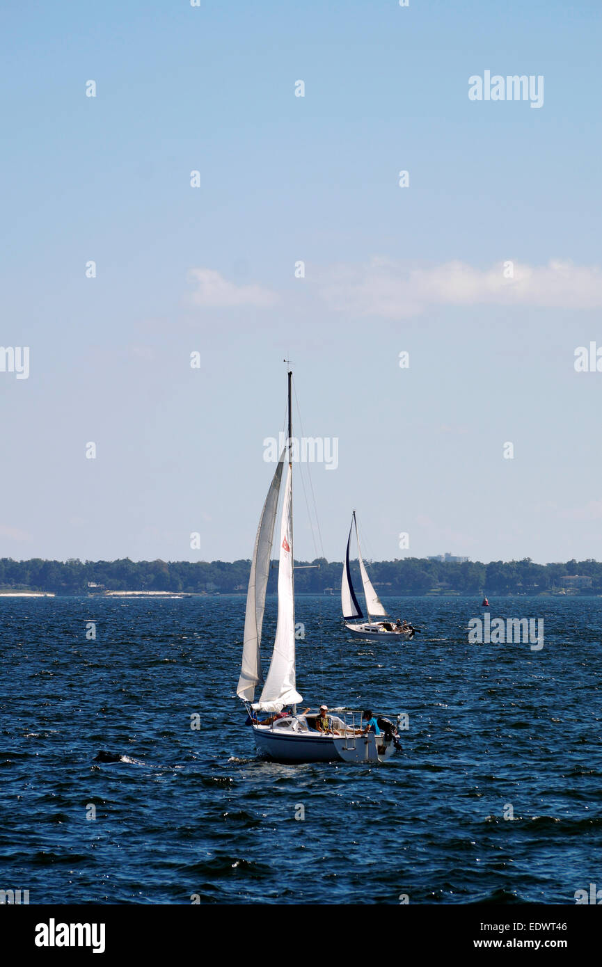Boats sailing in Pensacola harbor Stock Photo