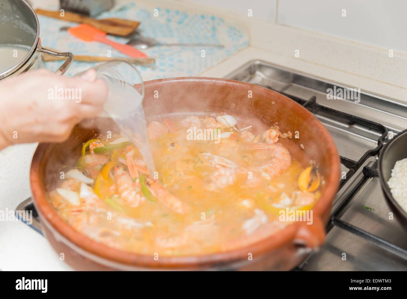 Valencian paella cooked seafood and rice Stock Photo