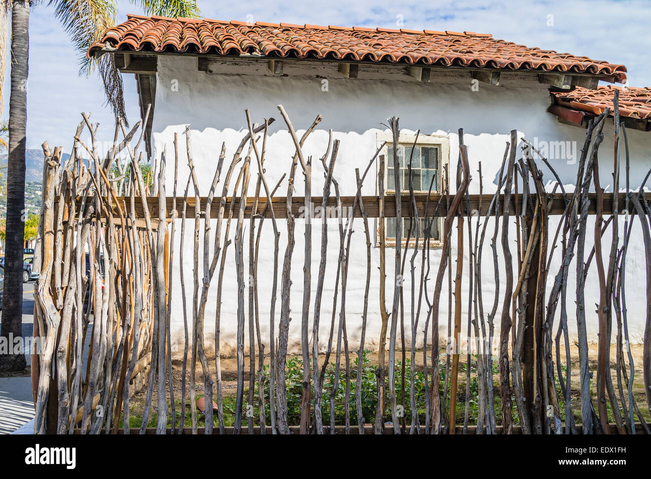 A fence constructed in the historic Spanish method using tree branches