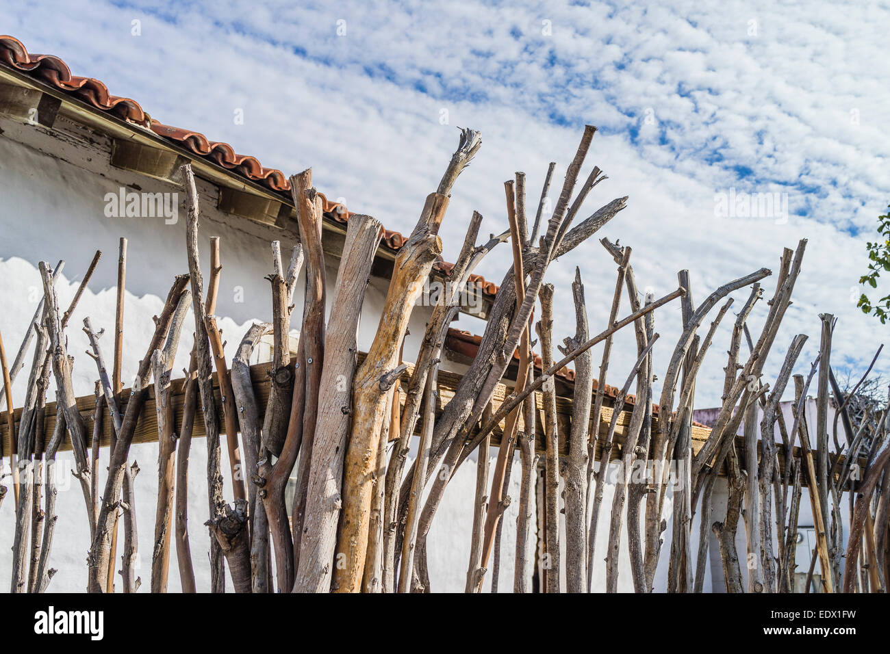 A fence constructed in the historic Spanish method using tree branches
