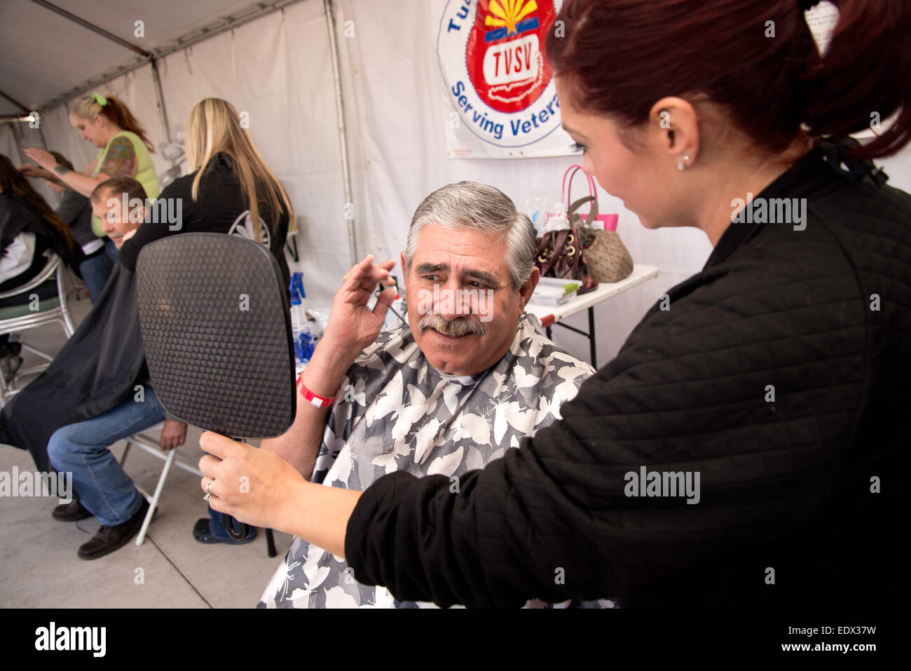 Tucson, Arizona, USA. Jan. 10, 2015. Homeless U.S. military veterans receive medical care, clothing and grooming at the 16th biannual Stand Down event hosted by Tucson Veterans Serving Veterans.  The U.S. Department of Housing and Urban Development estimated in January of 2014 that 49,933 American military veterans are homeless. Credit:  Norma Jean Gargasz/Alamy Live News Stock Photo