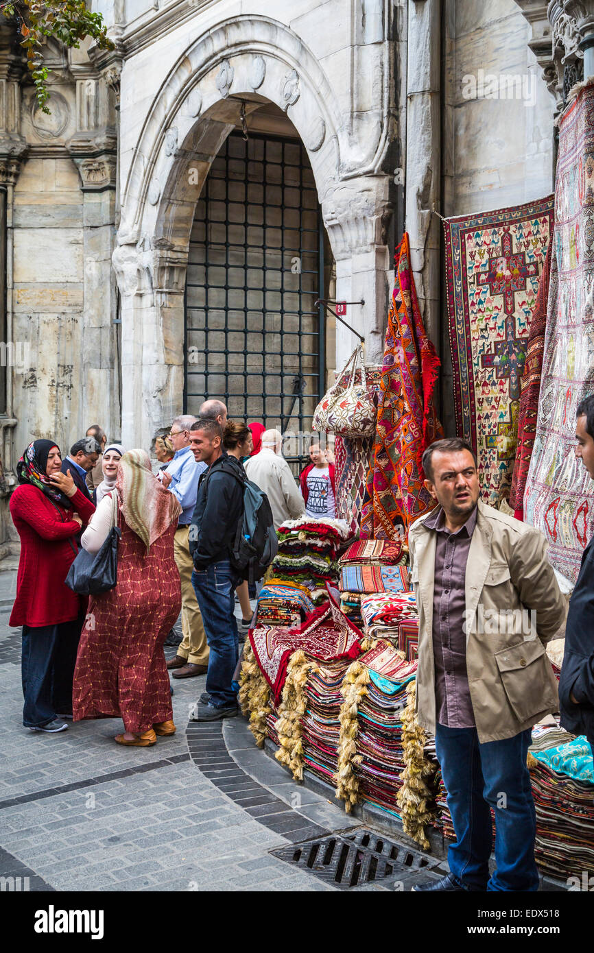 Groups of shoppers at the entrance to the Grand Bazaar in Sultanahmet, Istanbul, Turkey, Eurasia. Stock Photo