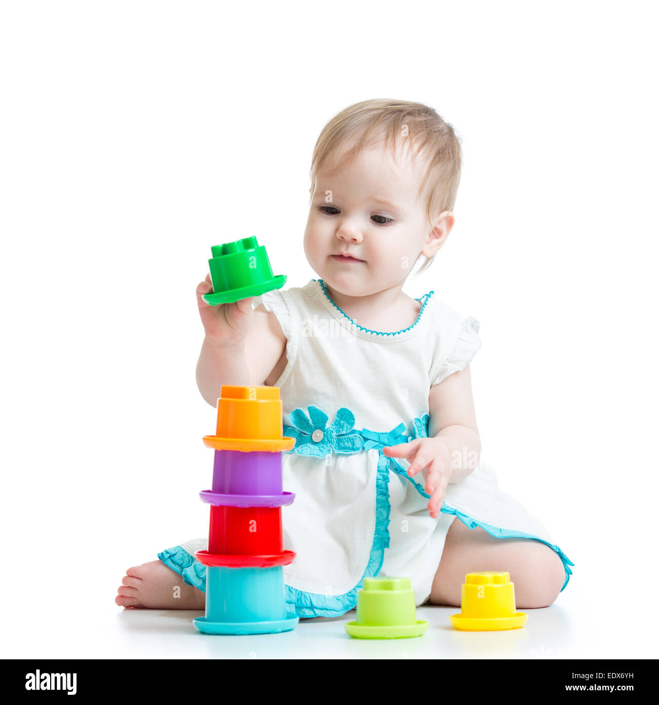 little girl playing with toys Stock Photo - Alamy