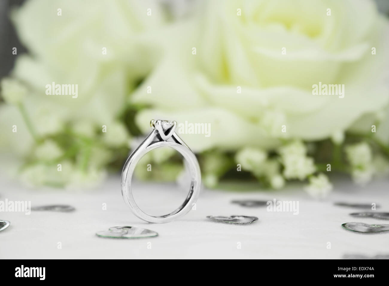 Artificial diamond solitaire rings.