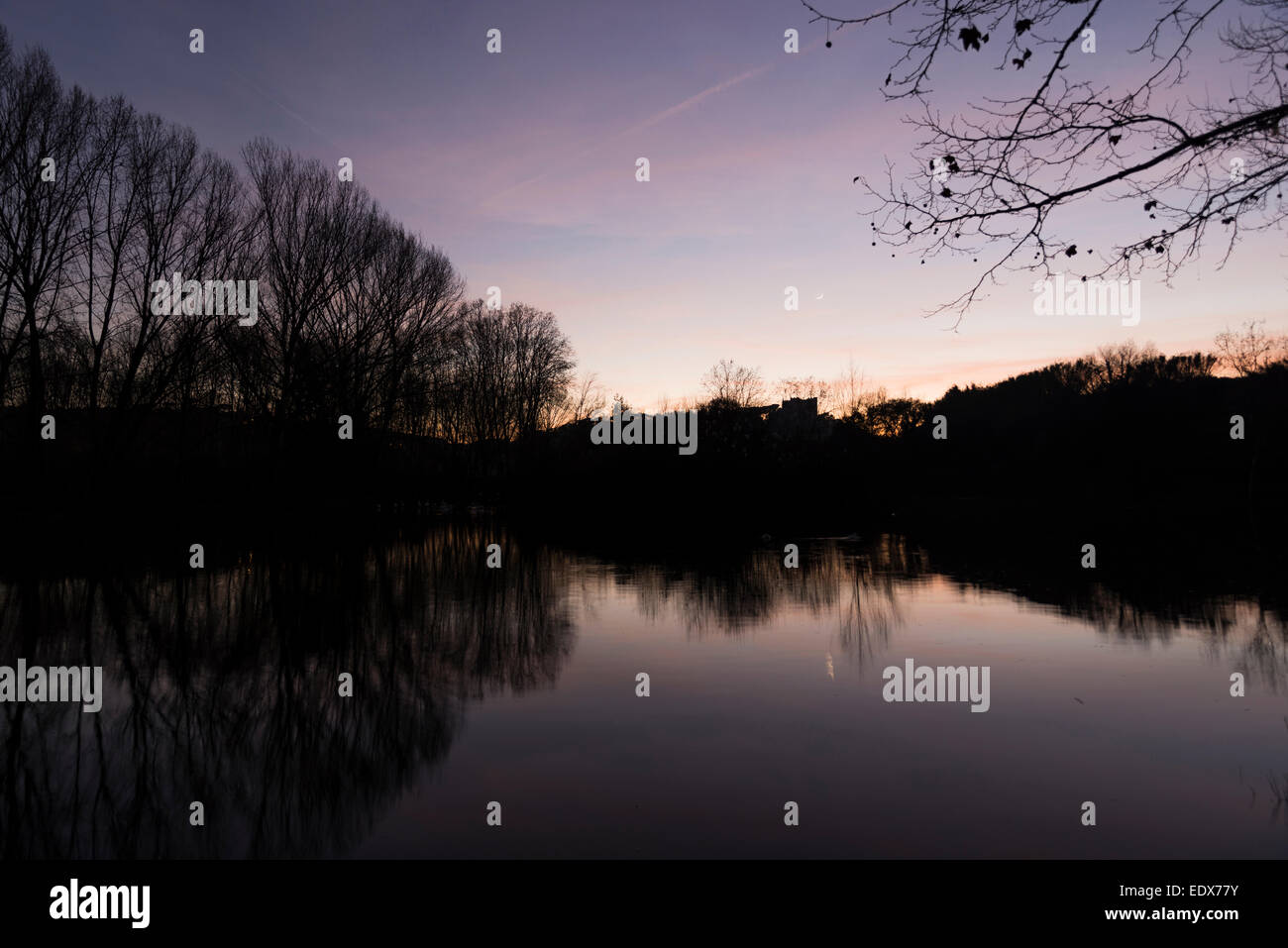 sunset on the lake in the Roca Del Valles Stock Photo