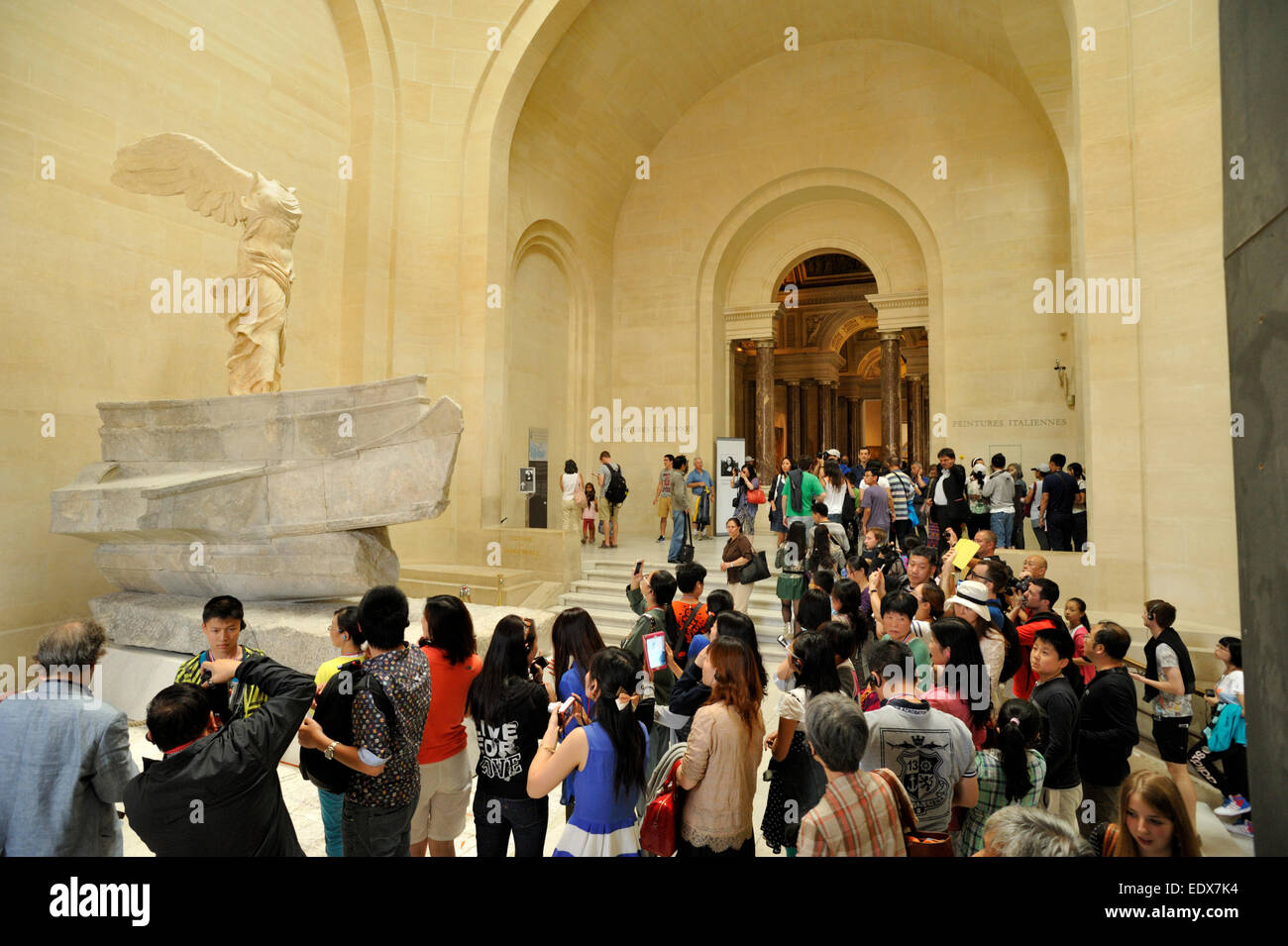 Paris, the Louvre Museum, Nike statue, crowd of tourists Stock Photo