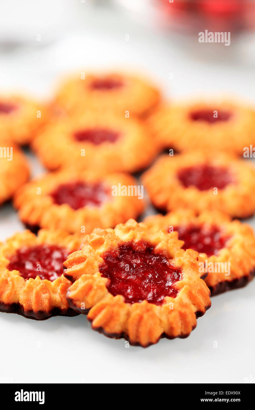 Chocolate Dipped Butter Cookies With Jam Center Stock Photo Alamy