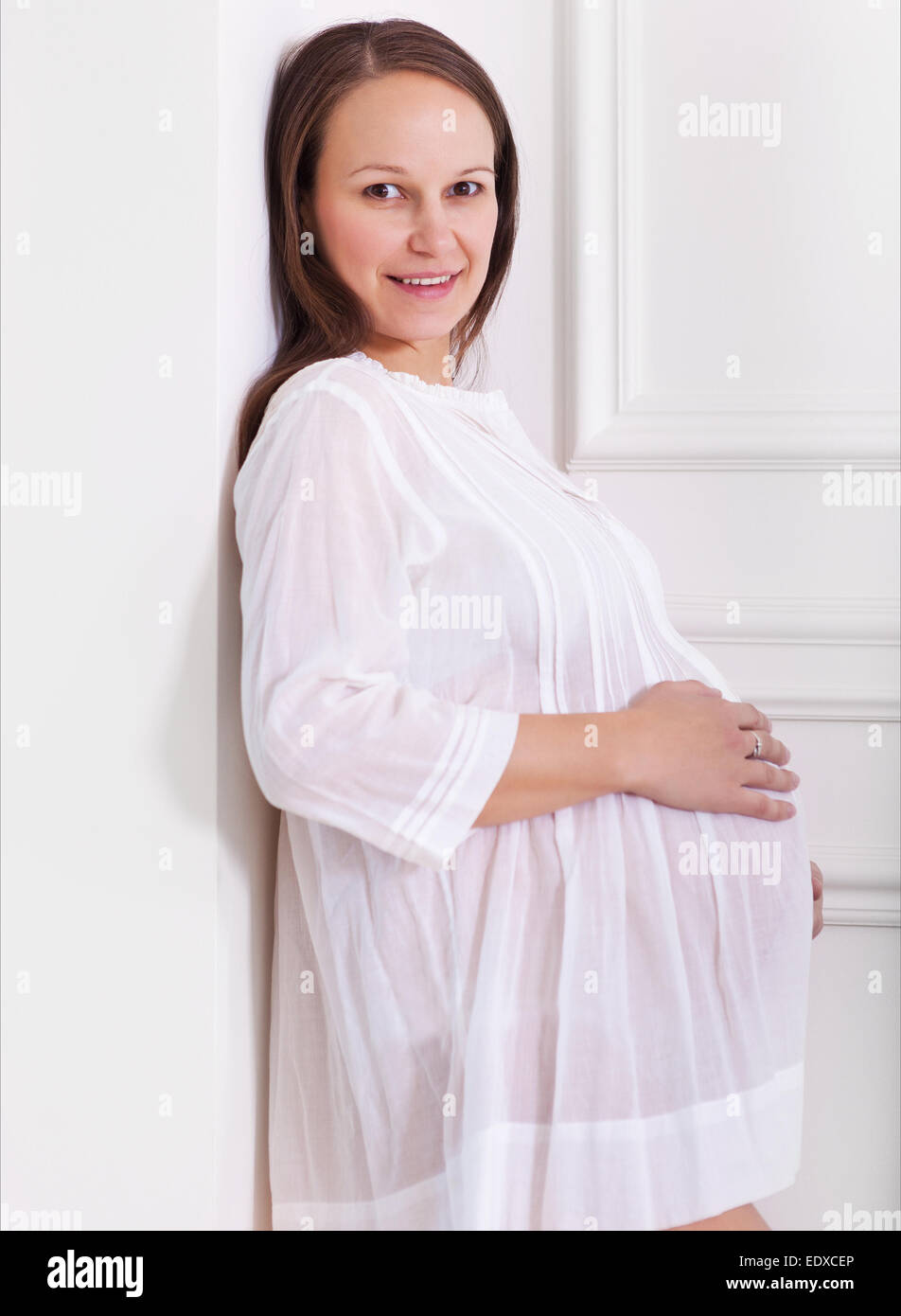 Portrait of the young smiling pregnant woman Stock Photo - Alamy
