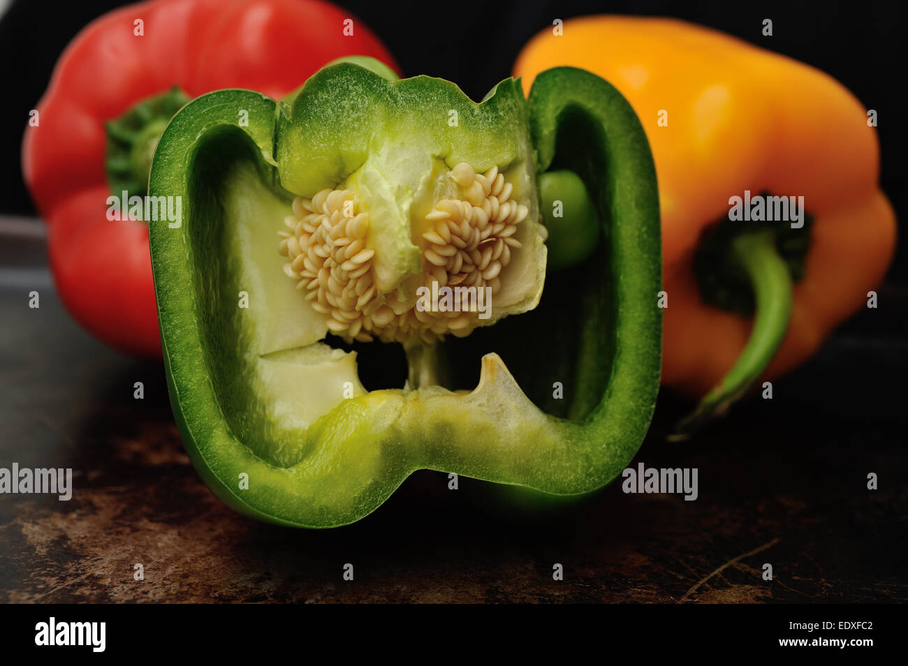 Green red and yellow bell peppers Stock Photo - Alamy