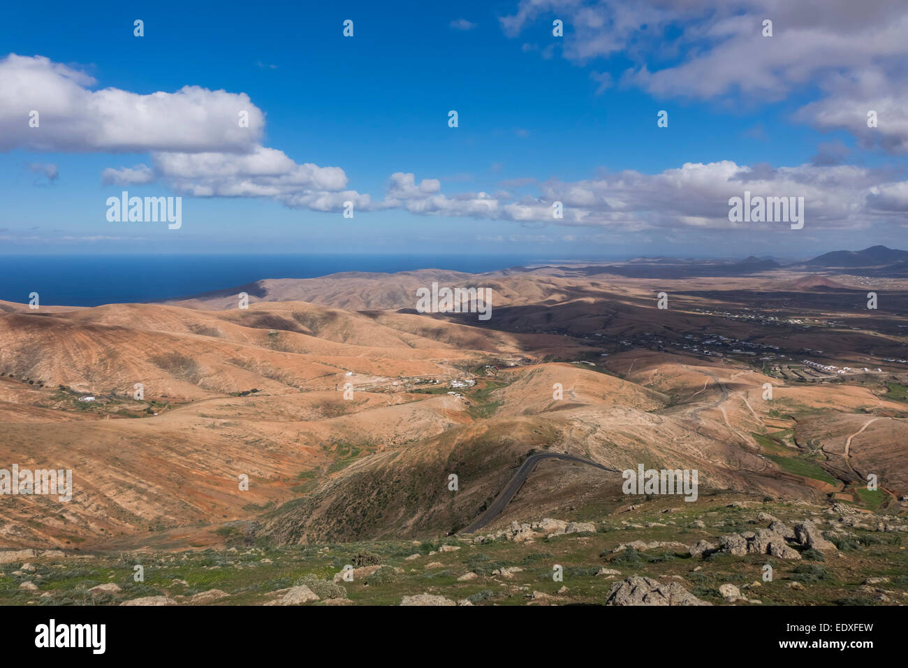 View across the  distant mountains with the sea in the distance in  Fuerteventura Canary islands Las palmas Spain Stock Photo