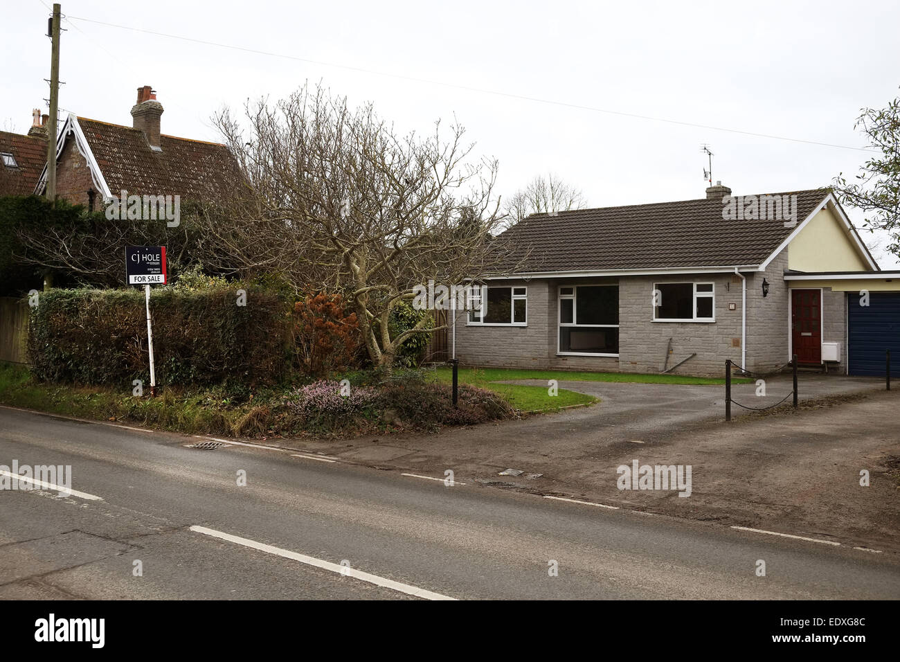 Traditional detached bungalow housing in the village of Cheddar