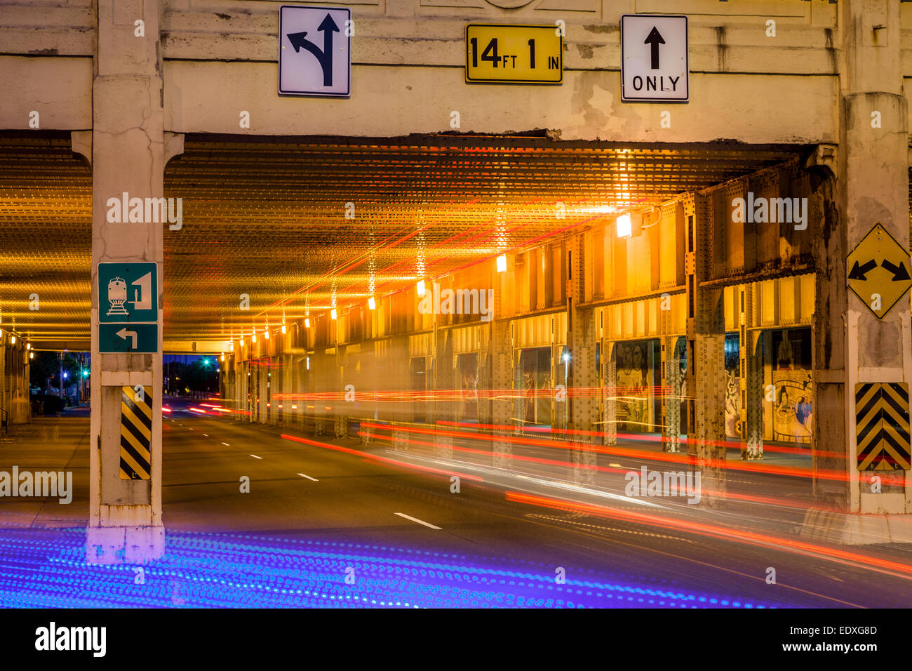 Underpass at night with light streaks from traffic Stock Photo