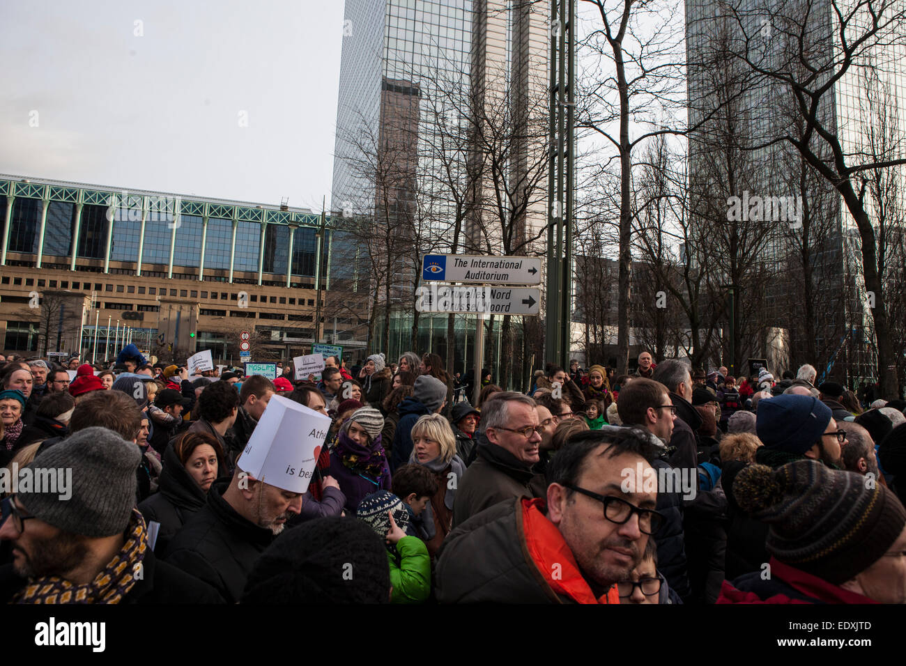 Brussels, Belgium. 11th Jan, 2015. 20,000 people attend #JeSuisCharlie March in Brussels, bringing together different cultures and religions following the attack on the Charlie Hebdo satirical magazines offices in Paris and the subsequent hostage taking at a Jewish shop. Brussels, a multicultural city, and Europe’s comics capital, has suffered its one sectarian attacks in current times, when four people were shot and killed at the city's Jewish museum in May 2014. Credit:  deadlyphoto.com/Alamy Live News Stock Photo
