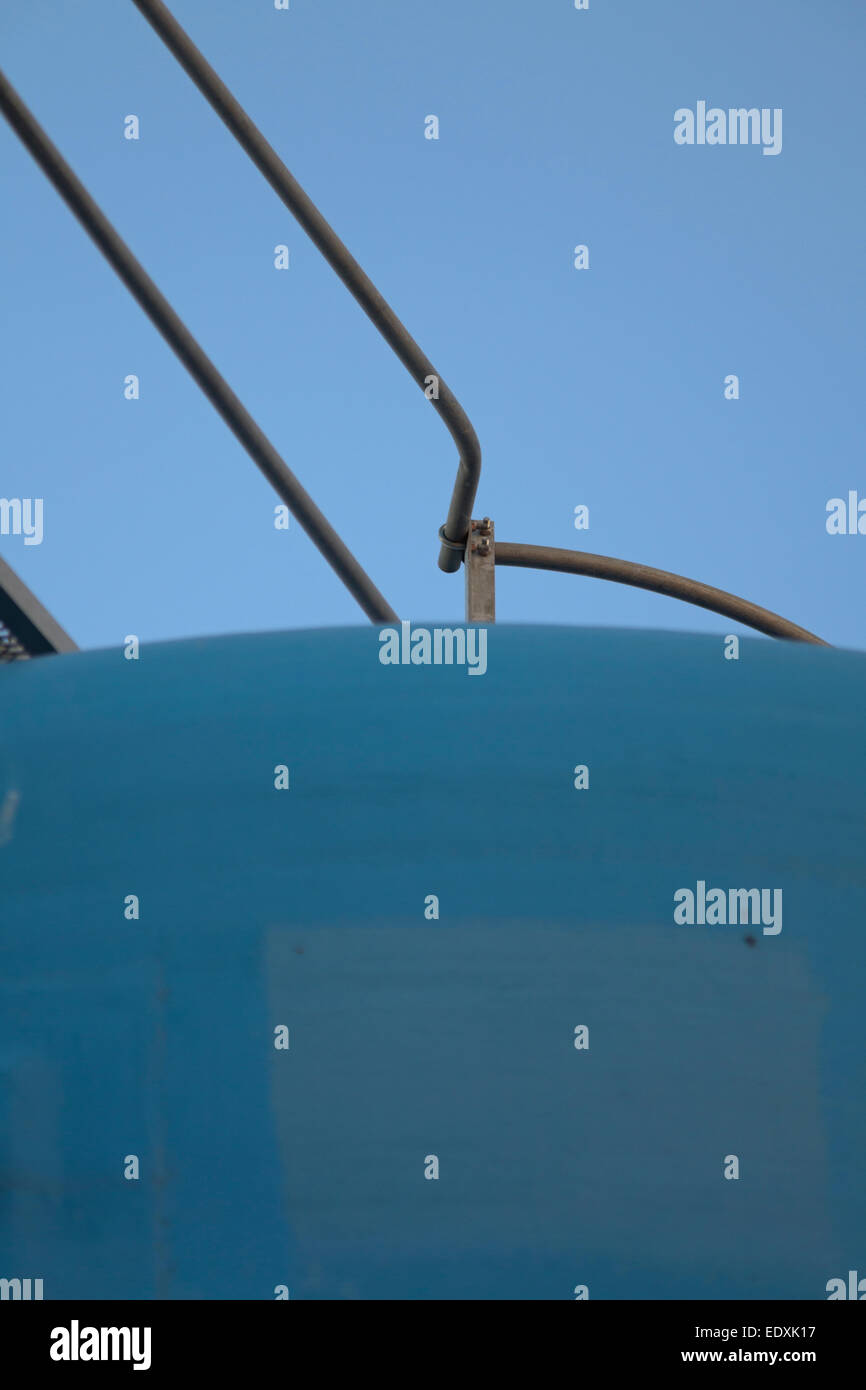 Top of blue oil tank for storing edible oils made from fish Stock Photo
