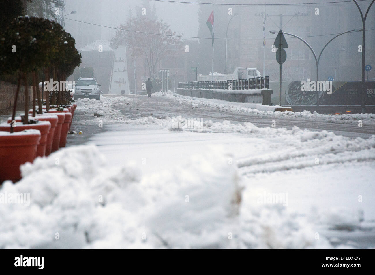 Amman, Jordan. 11th Jan, 2015. Snow and sleet cover the roads in Amman, Jordan, 11 January 2015. Road air have been limited due to unusual strong snowfall in the