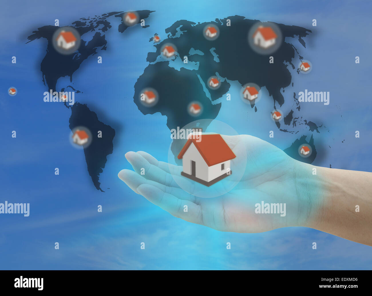 hand hold house for insurance concept with world map Stock Photo