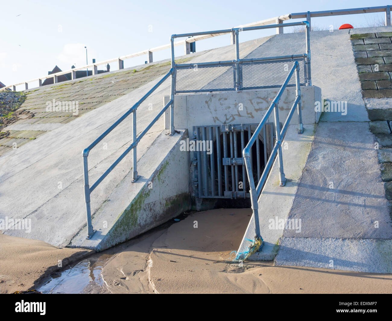 Flood protection storm water drain outlet in sea wall built 2013 Stock