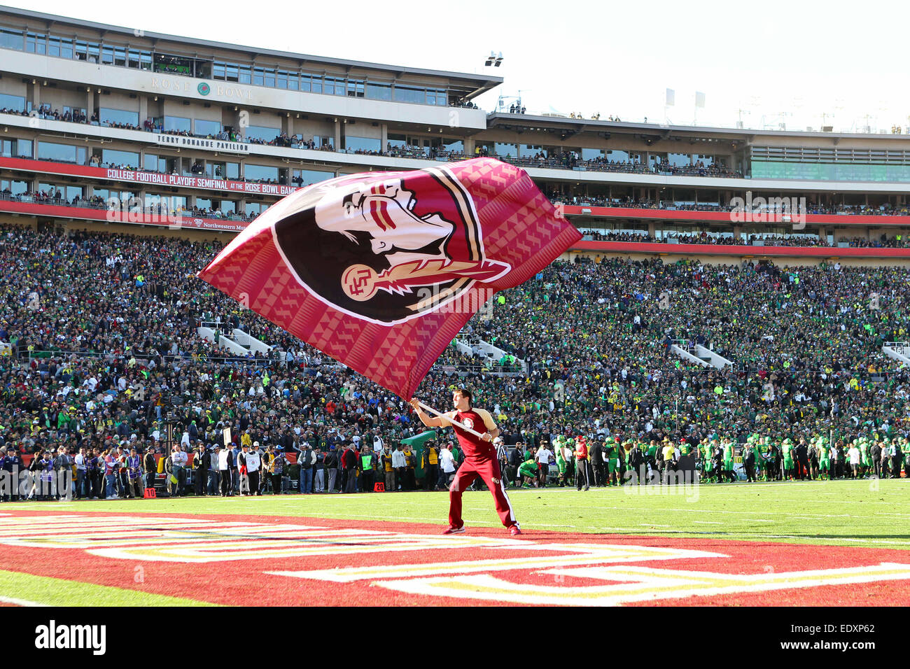 January 01, 2015 Florida State Seminoles cheerleader runs with a flag on the field during the College Football Playoff Semi final at the Rose Bowl Game presented by Northwestern Mutual at the Rose Bowl in Pasadena, California.Charles Baus/CSM Stock Photo