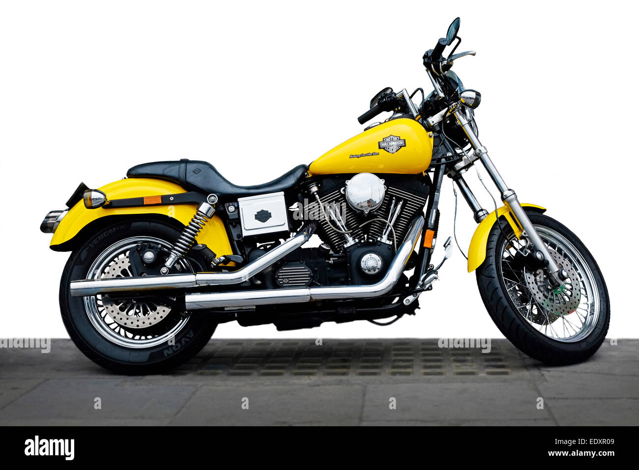 Harley Davidson Cruiser 1200 cc Motorcycle partial Cut out Yellow and chrome, Dublin street Stock Photo