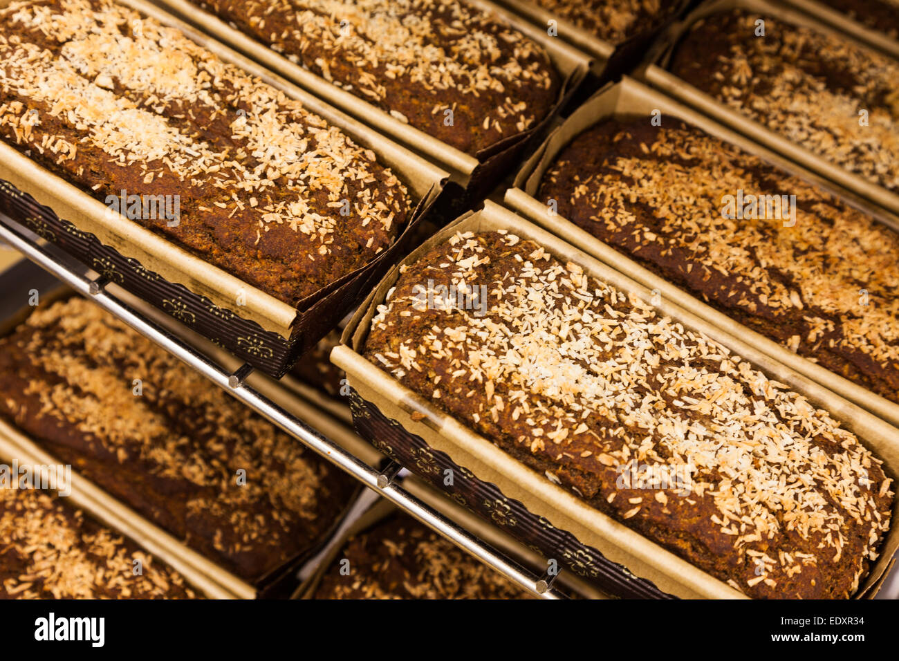 Gluten-free and vegan coconut-banana dessert loaves fresh out of the oven Stock Photo