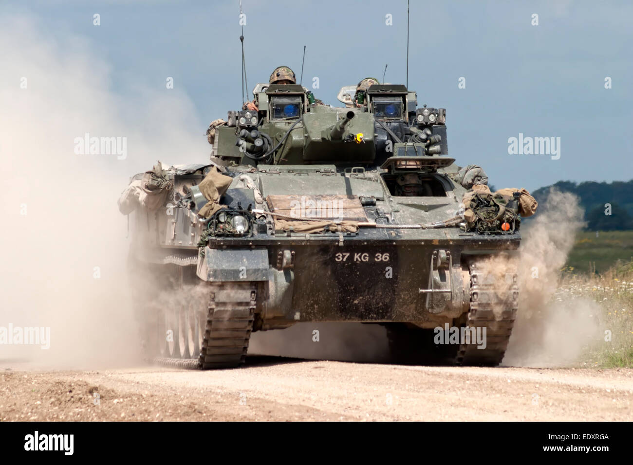 A British Army Warrior Infantry Fighting Vehicle, on the Salisbury Plain military Training Area in Wiltshire, United Kingdom. Stock Photo
